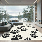 Playful Black Wildlife Paw Track Rug