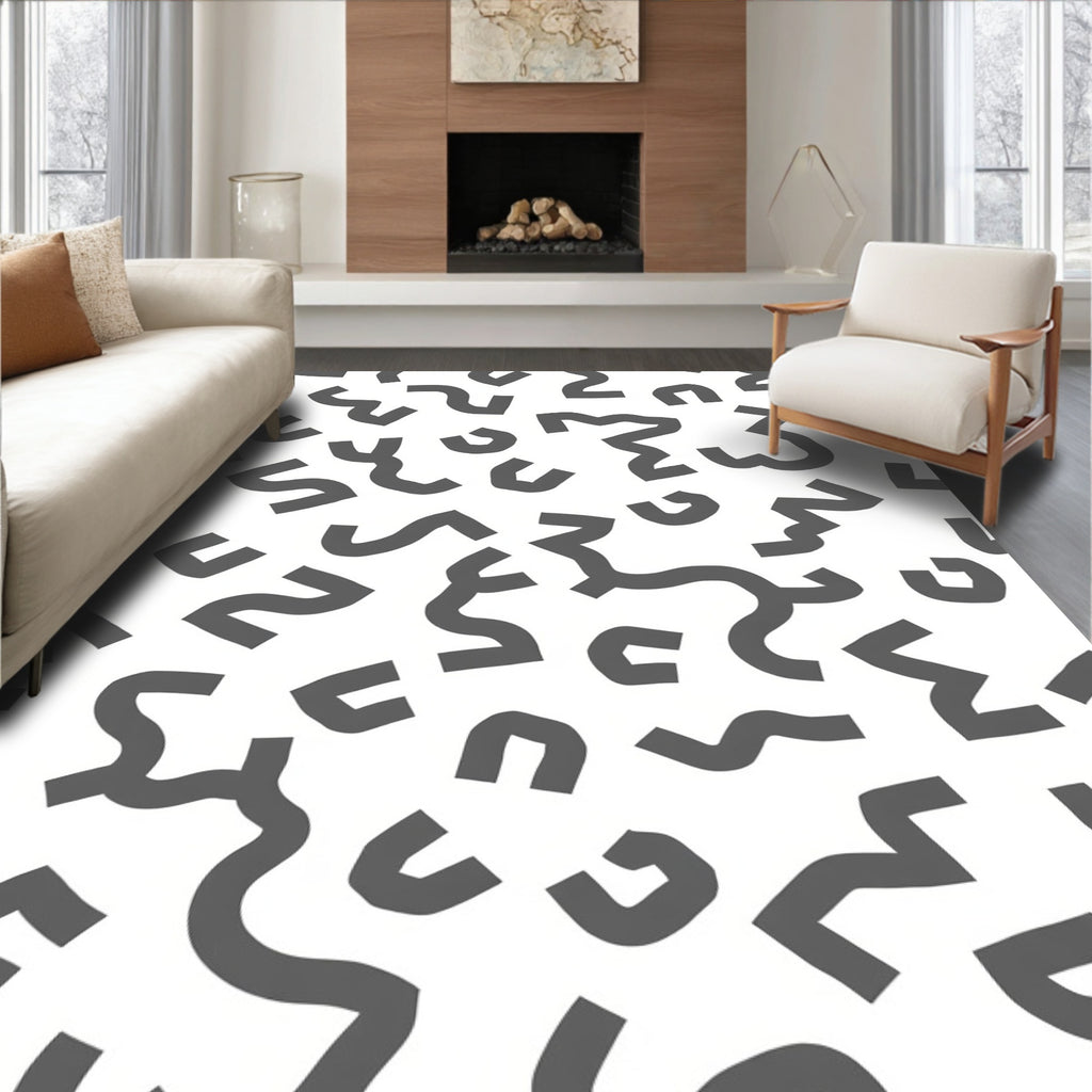 Monochromatic Abstract Cutout Shapes Rug